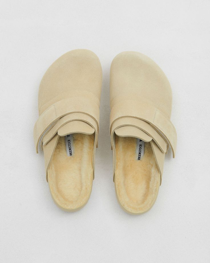 Covered toe with overlapping straps. Cazador suede and shearling. Made in Germany. Cheap Beige Flat Slides, Womens Bedroom Shoes, Trendy Cheap Flat Slippers, Cheap Trendy Flat Slippers, Hygge Shoes, Billowy Shoes, Taupe Shoe, Tekla Fabrics, Straw Shoes