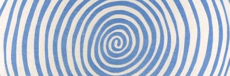 an abstract blue and white background with spirals in the center, as if it were optical art