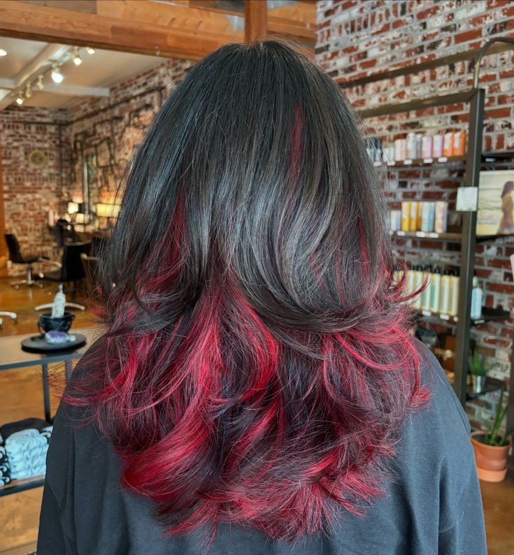 Chunky red peekaboo highlights w/ cut. ⛓️DM OR CLICK THE LINK IN BIO TO BOOK�⛓️ . . . . . #althairstylist #althair #redhighlights #peekaboohair #curtainbangs #90sblowout #creativecolorspecialist #vividhaircolor #vividhairstylist #dangerjonescreative #pravanavivids #hairtok #shaghaircut #916hairstylist #sacramentotiktok #independenthairstylist #transformationhaircut #amandapadillahair Dark Hair With Vivid Peekaboo, Black Red Peekaboo Hair, Layered Hair With Red Highlights, Hidden Chunky Highlights, Peekaboo Hair Color Red And Brown, Ref Highlights, Dyed Wolfcut Hair, Black Hair With Dark Green Highlights, Black Hair With Tips Dyed