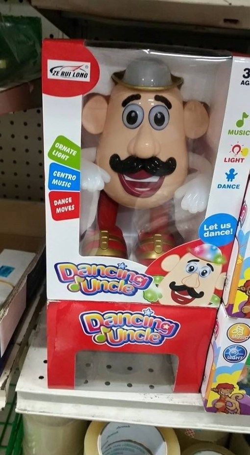 a toy with a mustache and hat on display in a store