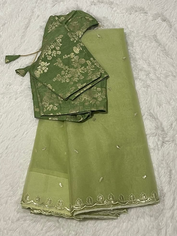 Light pista green shade lightweight partywear organza designer saree teamed up with contrast designer blouse  . Condition: BrandNew Care instructions:Drywash  Blouse size: 38 allowance provided  Blouse color : pistachio green shade Pista Saree Contrast Blouse, Pista Green Blouse Designs, Blouse Ideas For Organza Sarees, Light Green Saree Blouse Combination, Green Color Blouse Designs, Organza Saree Blouse Design, Pista Green Saree Contrast Blouse, Pista Colour Saree, Pista Green Organza Blouse Piece For Festivals