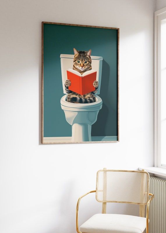 a cat sitting on top of a toilet reading a book in a room with white walls