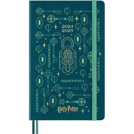 a harry potter notebook with hogwarts symbols on it