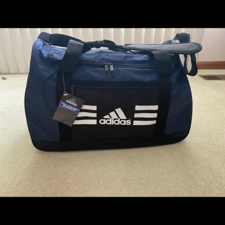 Brand New With Tags! Large Black And Blue Adidas Duffel Bag, Small Outside Zipper Pocket On The Front, Zipper Closure On Top, Handles And Shoulder Strap. Measurements Shown In Images. Functional Blue Adidas Bags, Blue Adidas Bags For Everyday Use, Adidas Blue Bags For Everyday Use, Blue Sporty Adidas Bag, Adidas Casual Blue Bags, Sporty Blue Adidas Bag, Casual Blue Adidas Bag, Blue Adidas School Bags, Adidas Blue School Bags