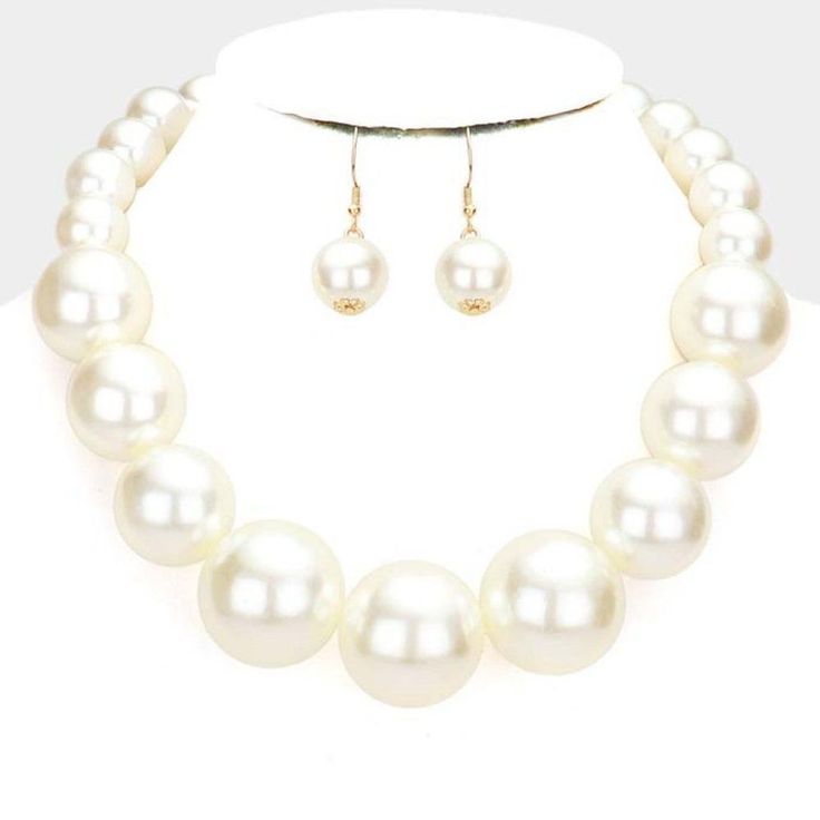 Cream Faux Pearl Necklace & Earring Set Item: Faux Pearl Necklace Brand: Sparkle Armand Color: Cream, Gold Necklace Length: 18" + 4" Extension Decor Size: 1.2" (Inches) Earring Length: 1.5" (Inches) Fastening: Lobster Clasp Metal: Alloy Materials: Faux Pearls Theme: Bridal, Prom, Pageant, Evening All Measurements Are Approximate Sold As One Individual Necklace & 1 Pair Of Matching Earrings Classy Necklace, Stone Statement Necklace, Pearl Necklace Earrings, Rhinestone Choker, Round Stud Earrings, Chain Choker Necklace, Faux Pearl Necklace, Gold Tone Necklace, Leather Necklace