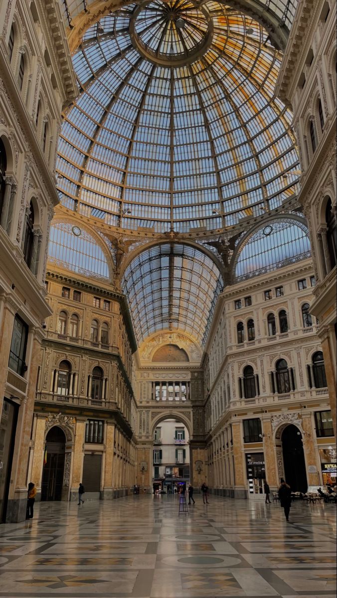 the inside of a large building with many windows