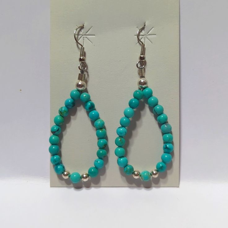 Just Made And Never Worn. Teardrop Shaped Earrings That I Hand Beaded With Authentic Kingman Turquoise Blue Beads, 2 Sterling Silver 5mm, One 7mm Sterling Silver Bead On Each Earring, And Ear Wires Are Stainless Steel. Hand Strung On A Soft Flex Steel Wire So Sturdy And Quality Is A Must Of Longtime Wear. These Are Part Of My West Star Collection. All Questions And Comments Are Welcome. Bead Earrings, Simple Bead Earrings, Turquoise Bead Earrings, Silver Bead Earrings, Turquoise Earrings Dangle, Star Jewelry, Kingman Turquoise, Silver Bead, Turquoise Earrings