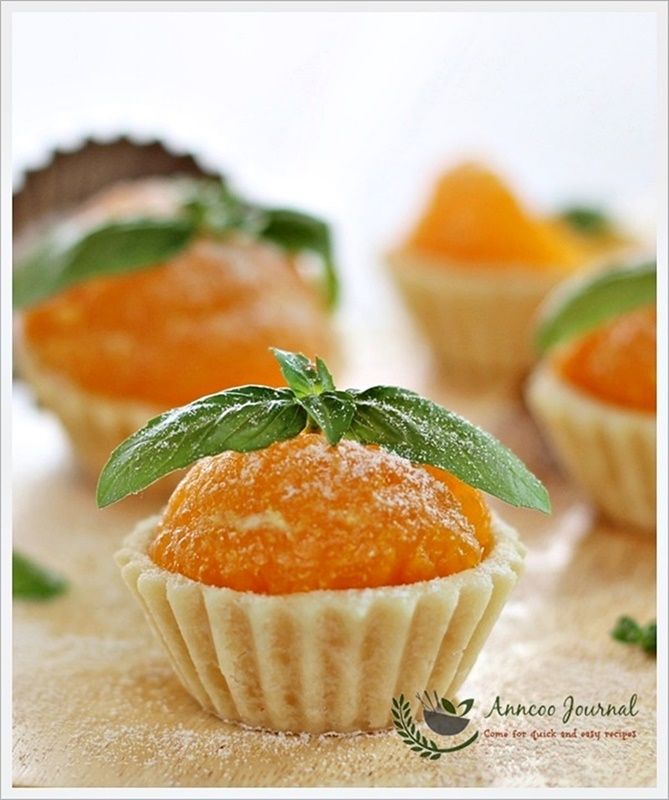 small orange cupcakes with leaves on top