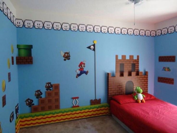 a bedroom decorated in blue and red with mario bros decorations