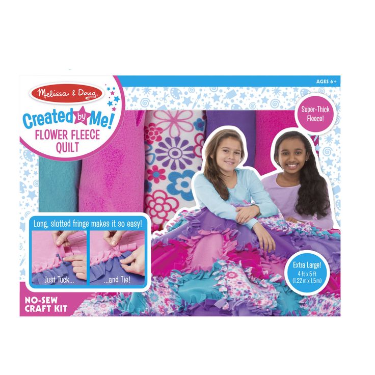 the crocheted me flower fleece quilt kit is shown in pink and blue