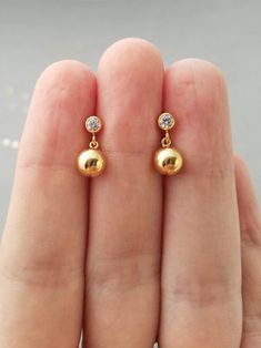 Gold Post Earrings, Small Studs Gold, Small Gold Jumkas Design, Jwellary Design Gold Earrings, Simple Jumka Earrings Gold, Simple Studs Gold, Gold Hangings For Ears, Small Diamond Hanging Earrings, Ear Rings Hangings Gold