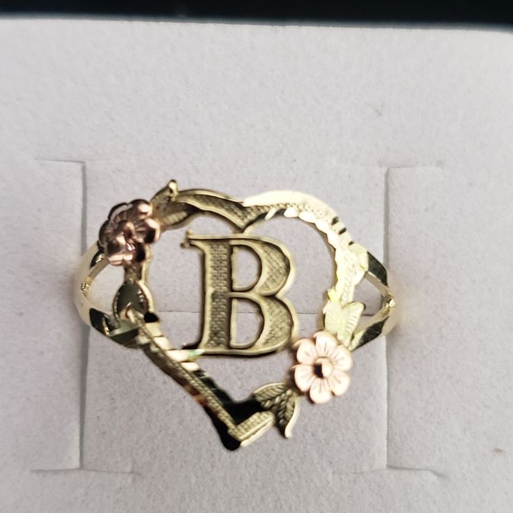 10kt Gold Initial Ring Weight 1.60gms Width 13.5mm Front And 2.0 Mm Back Size 8.5 No Stones Just A Diamond Cut On Top Of The Ring,Flowers Is In Rosegold. 100% Authentic 10kt Gold Ring Initial Rings Gold, Initial Rings, Gold Initial Ring, Letter Ring, Initial Ring, Gold Initial, Rings Gold, Ring Color, Womens Jewelry Rings