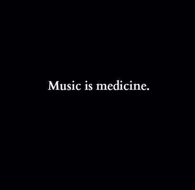 the words music is medicine written in white on a black background