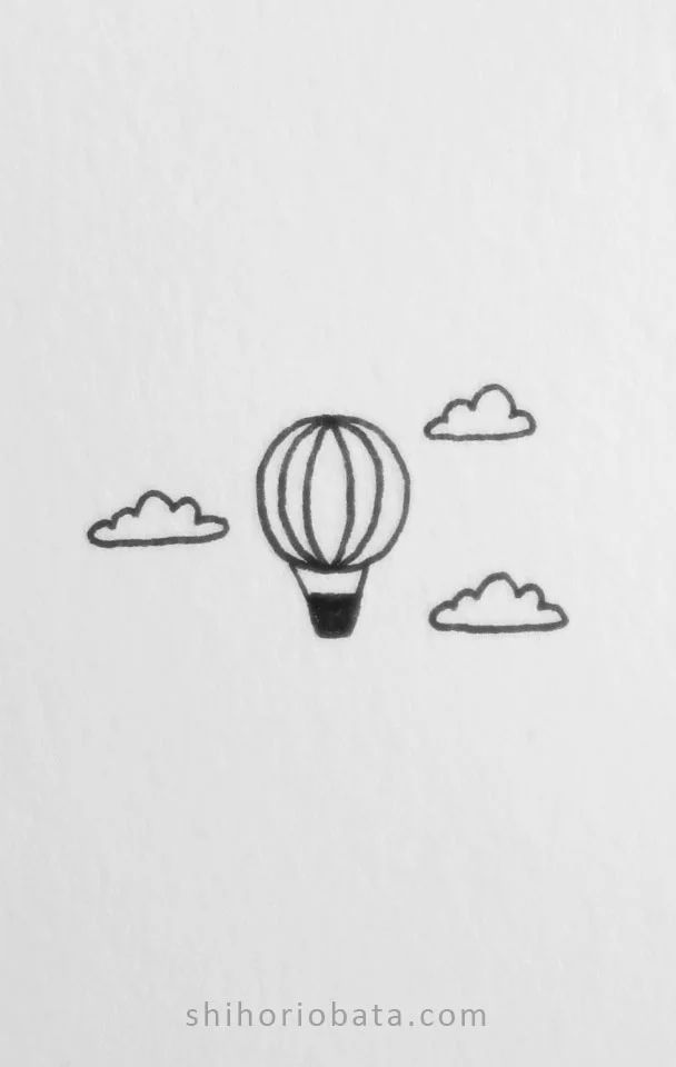 a drawing of a hot air balloon in the sky