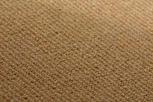 a close up view of a tan carpet