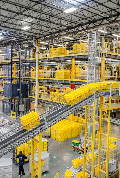 the inside of a large warehouse filled with lots of yellow items