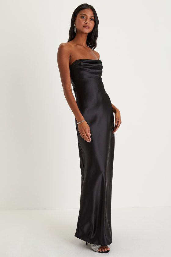 You'll be the classiest invite of the night in the Lulus Exquisite Shine Black Satin Rhinestone Strapless Maxi Dress! Sleek woven satin shapes this luxurious dress that features a strapless bodice with a rhinestone-trimmed sweetheart neckline (with hidden no-slip strips) that peaks out from a cute foldover detail. The figure-flattering slip silhouette falls to an elegant maxi hem. Hidden side zipper/clasp. Fit: This garment fits true to size. Length: Floor length. Size medium measures 52.25" fro Black Satin Bridesmaid Dress, Rhinestone Maxi Dress, Maxi Dress Satin, Luxurious Dress, Luxurious Dresses, Dresses Formal Elegant, Black Dress Formal, Black Strapless Dress, Black Satin Dress