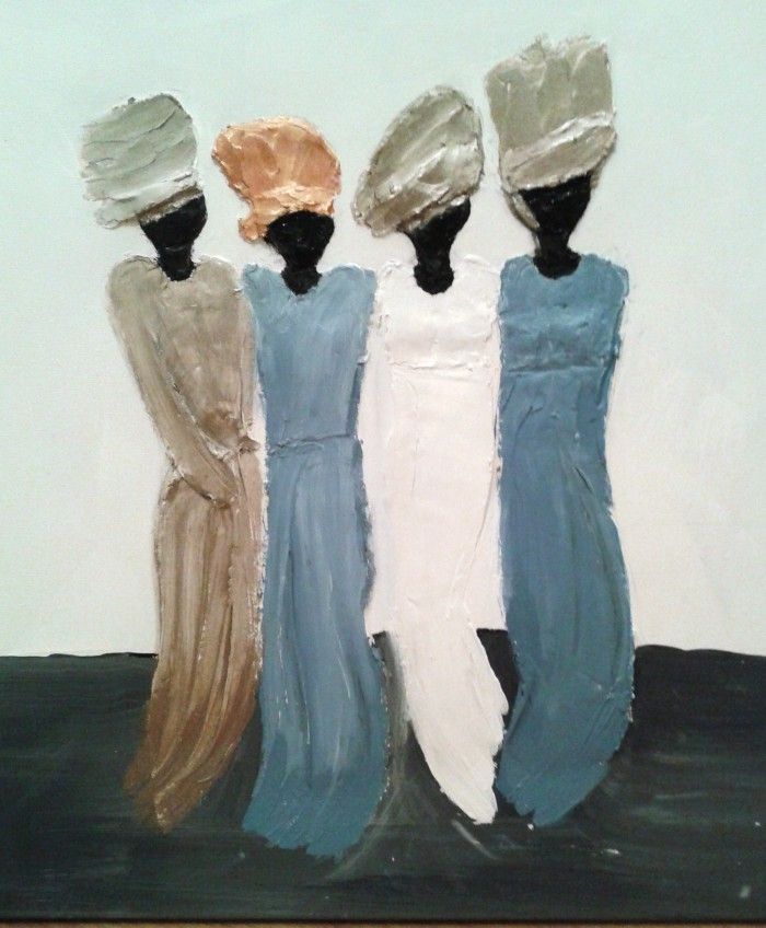 three women in white and blue dresses are standing next to each other with their hair pulled back