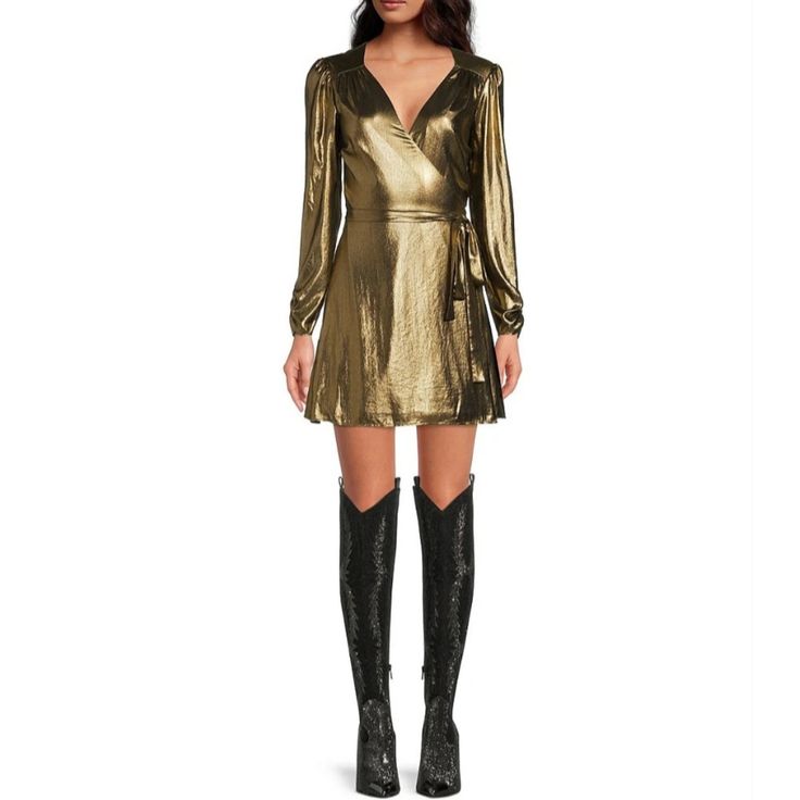 Gianni Bininoa Metallic Lame V-Neck Long Sleeve A-Line Wrap Dress Gianni Bini Noa Lame Shimmer And Shine Dressfrom Gianni Bini, This Dress Features: Metallic Lame Fabrication A-Line Silhouette V-Neckline Long Sleeves Wrap Closure Approx. 33.25" Length Polyester Dry Clean Imported. Approx Measurements Pit To Pit 21" Length 34" White Off Shoulder Dress, Camel Dress, Chambray Denim Shirt, Ruffle Wrap Dress, Blue Long Sleeve Dress, Dot Print Dress, Metallic Knit, Long Sleeve Wrap Dress, Half Sleeve Dresses