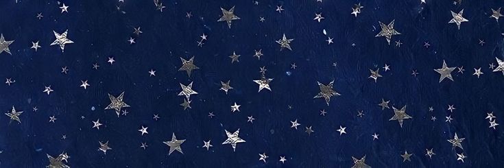 a blue background with silver stars on it