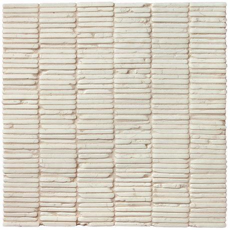 a white wall made out of stacks of paper