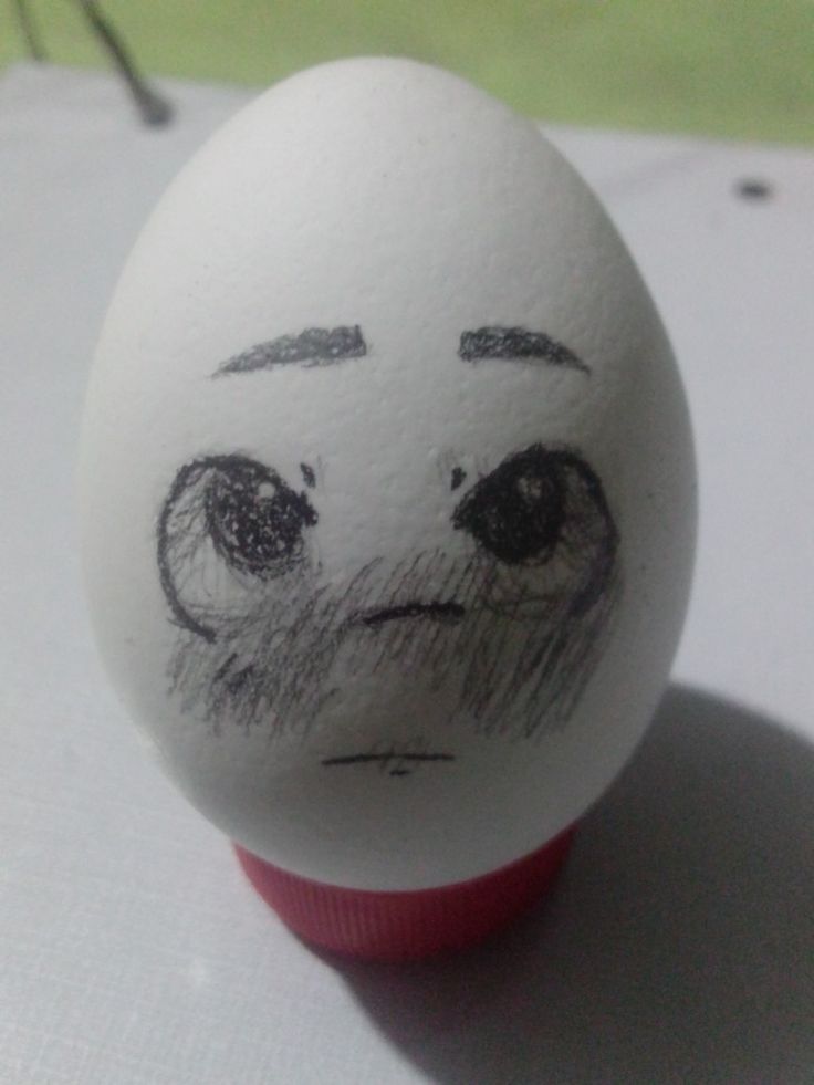 an egg with a face drawn on it