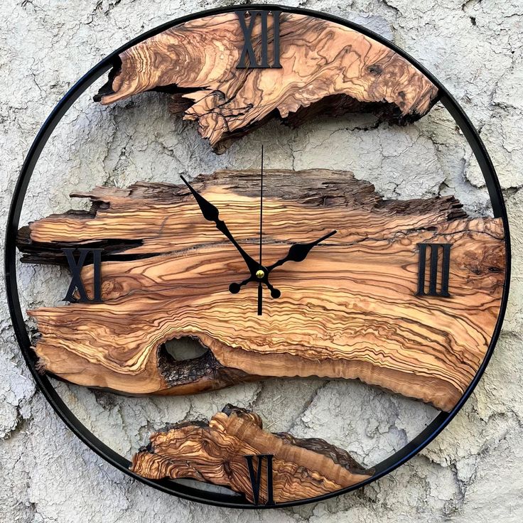 a clock made out of wood on the side of a stone wall with black hands