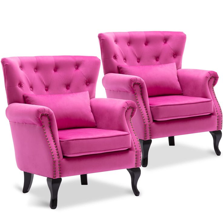 two pink chairs sitting next to each other