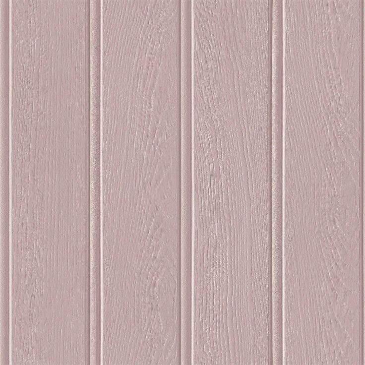 a pink wood paneled wall with vertical lines