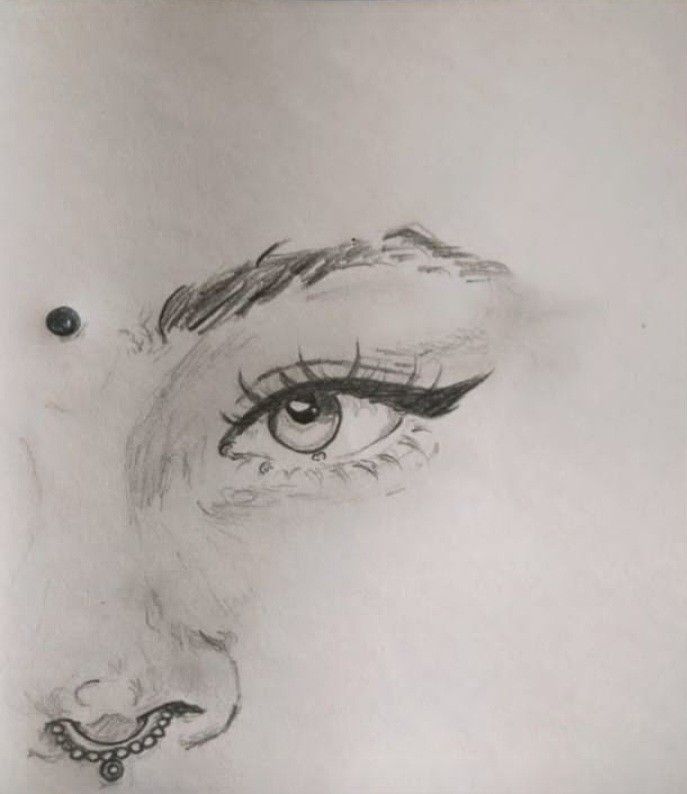 a pencil drawing of a woman's eye