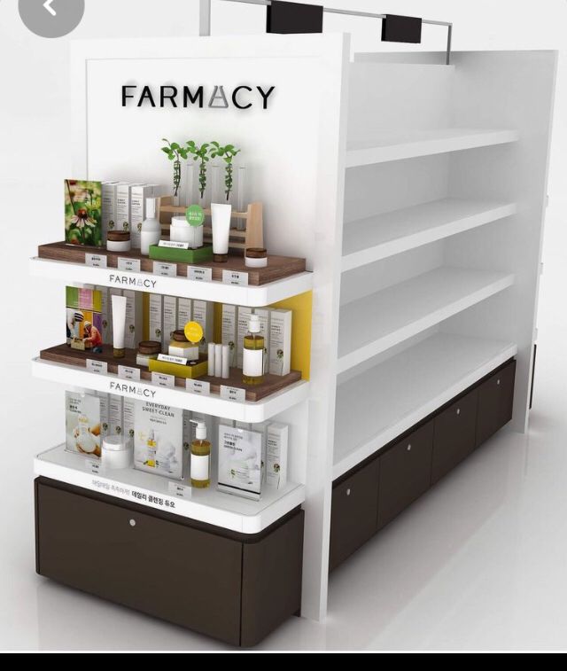 a display case with many different items on it's sides and the words farmacy above them