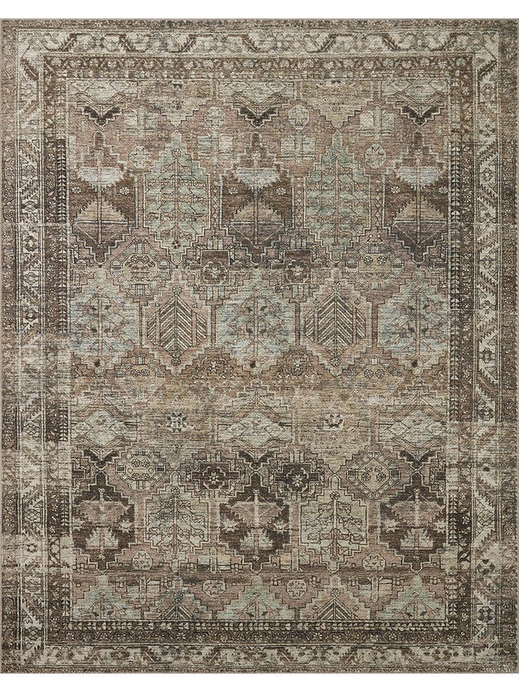 an antique rug with many different colors and patterns on the carpet, including beiges, browns