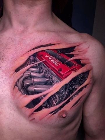 a man's chest with a tattoo on it that looks like a car engine