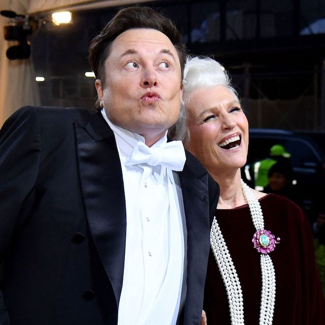 a man in a tuxedo standing next to an older woman with pearls on her necklace