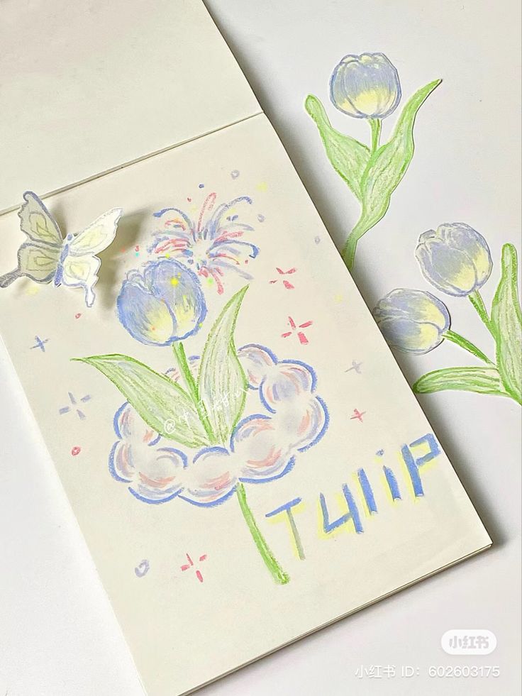 a card with flowers and butterflies on it next to the word'tulip '