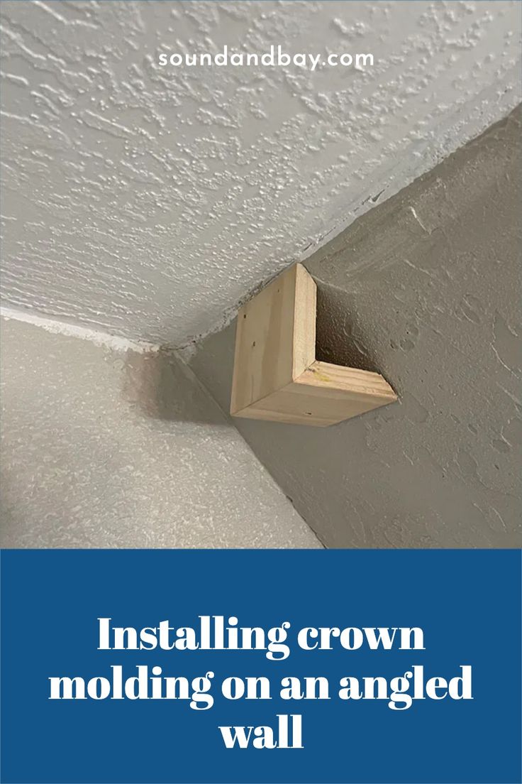 an angled wall with the words installing crown molding on an angled wall