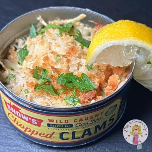 a close up of a bowl of food with a lemon