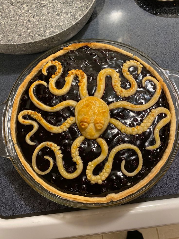 a pie with an octopus decoration on it