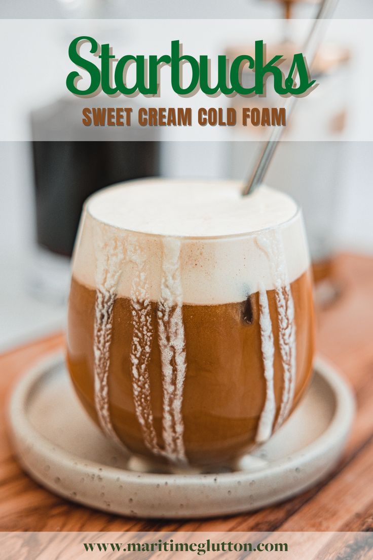 a cup filled with liquid sitting on top of a wooden table