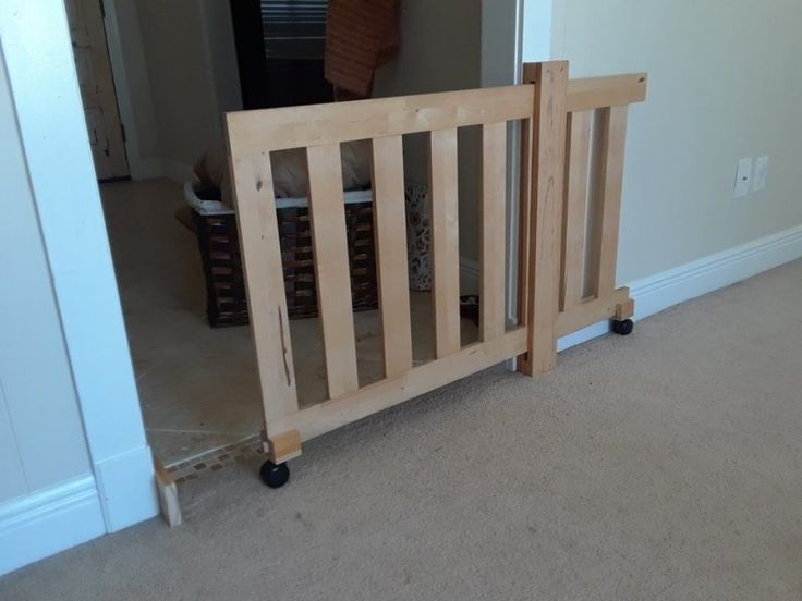 a baby gate in the middle of a room