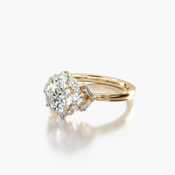 an engagement ring with two diamonds on the top and bottom, set in yellow gold