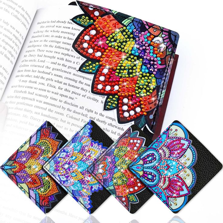 the bookmarks are decorated with colorful beads