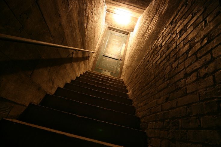 the stairs lead up to the light at the end of the tunnel that is lit