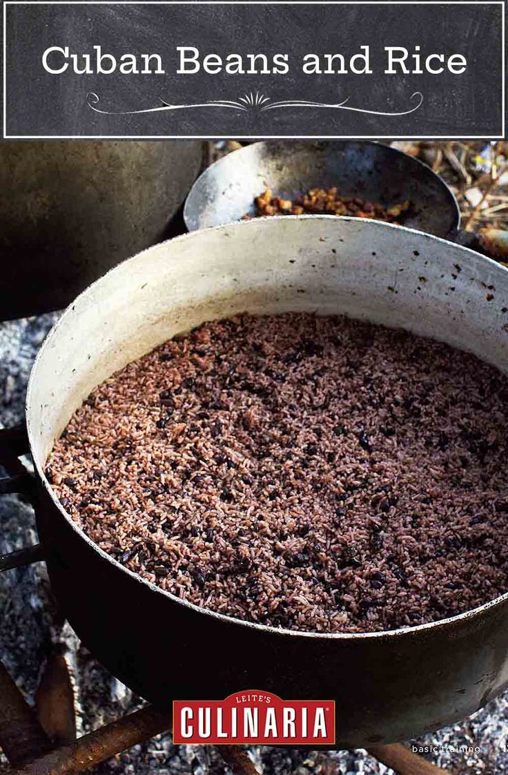 a pot full of dirt sitting on top of a stove next to an old kettle