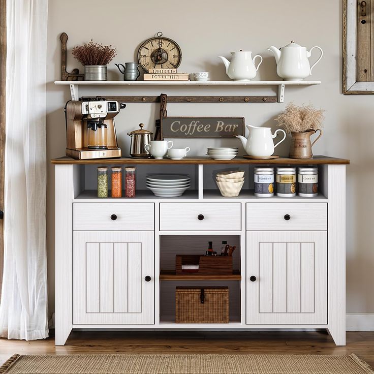 a coffee bar with white cupboards and shelves