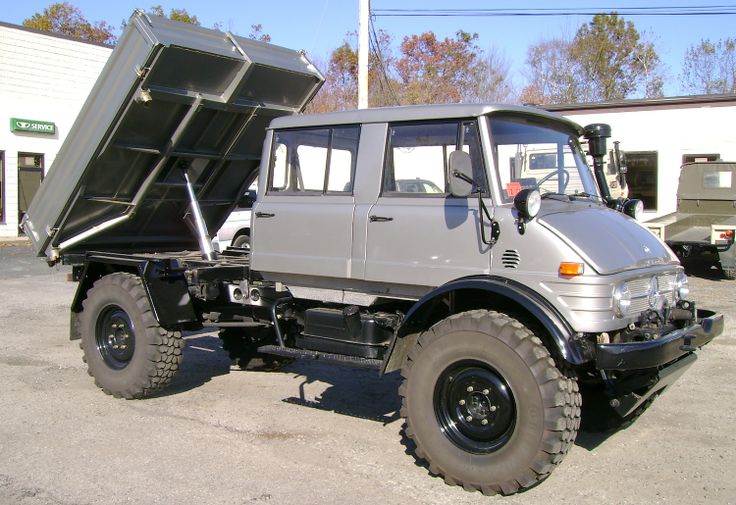 a large gray truck parked in a parking lot