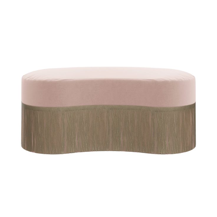 a pink and brown ottoman sitting on top of a white floor