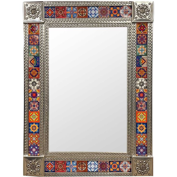 an ornate mirror with multicolored tiles on the frame and border around the edges