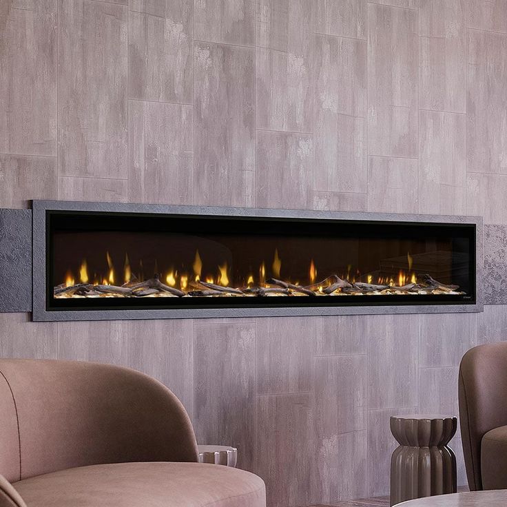 a wall mounted fireplace in a living room