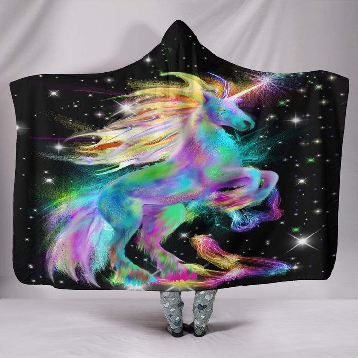 a hooded blanket with a colorful unicorn on it's face and stars in the background